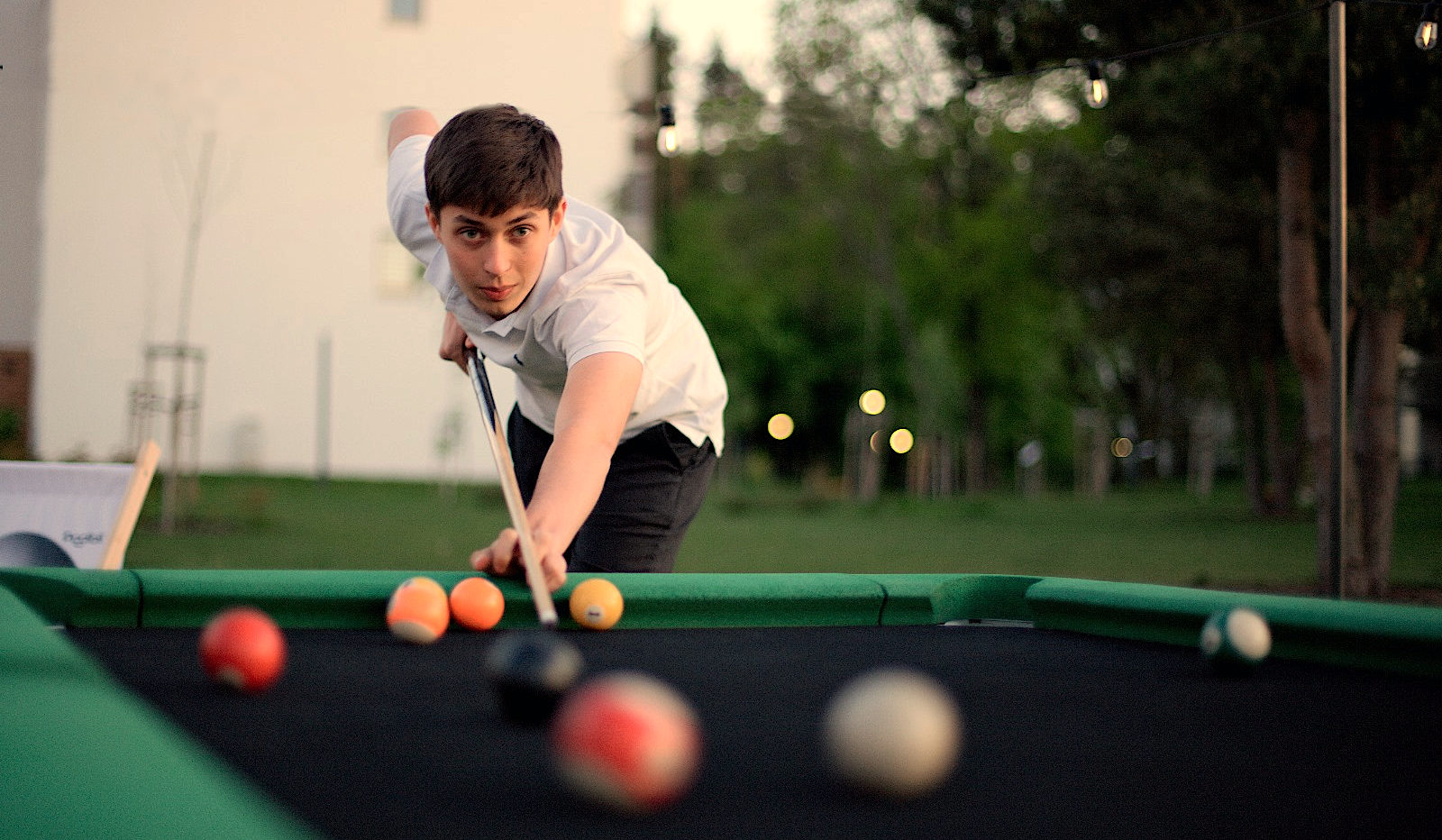 8 Ball Pool rules - a man playing pool Poolbil